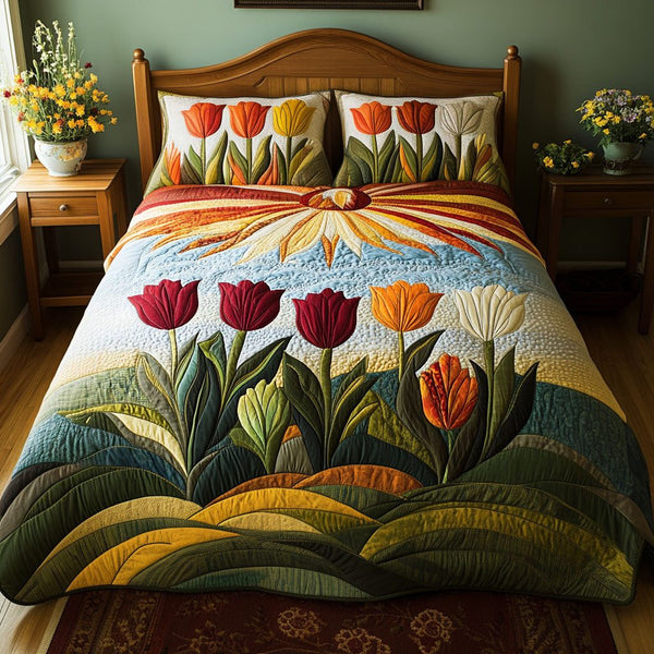 Sunset Garden quilted 3-piece bedding set on a made bed with two matching pillow shams