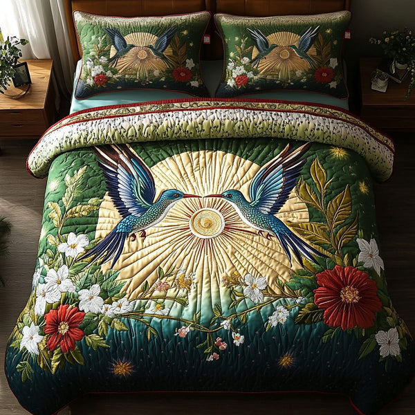 Sunset Glide quilted 3-piece bedding set on a made bed with two matching pillow shams