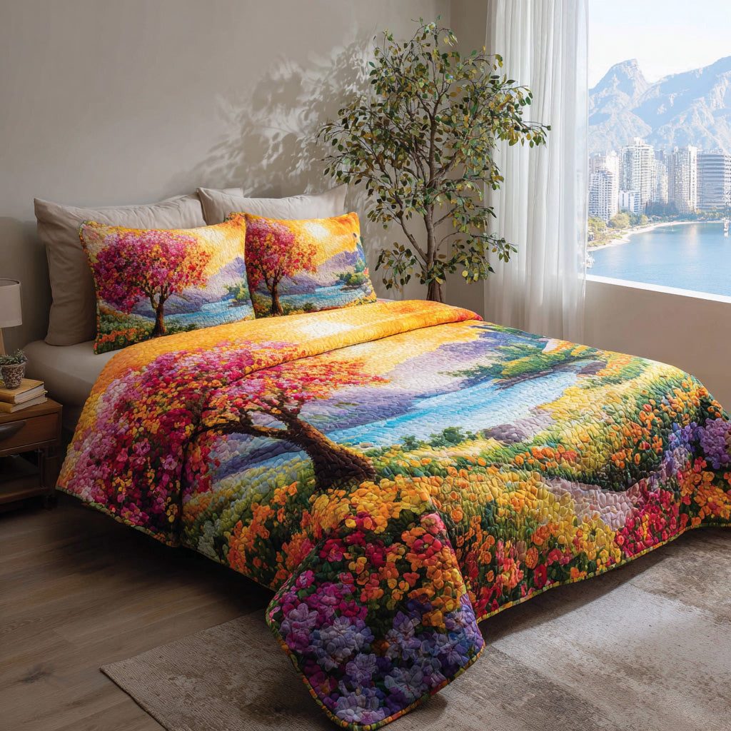 Sunset Meadow quilted 3-piece bedding set on a made bed with two matching pillow shams