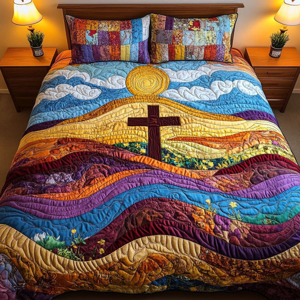 Sunset Path quilted 3-piece bedding set on a made bed with two matching pillow shams