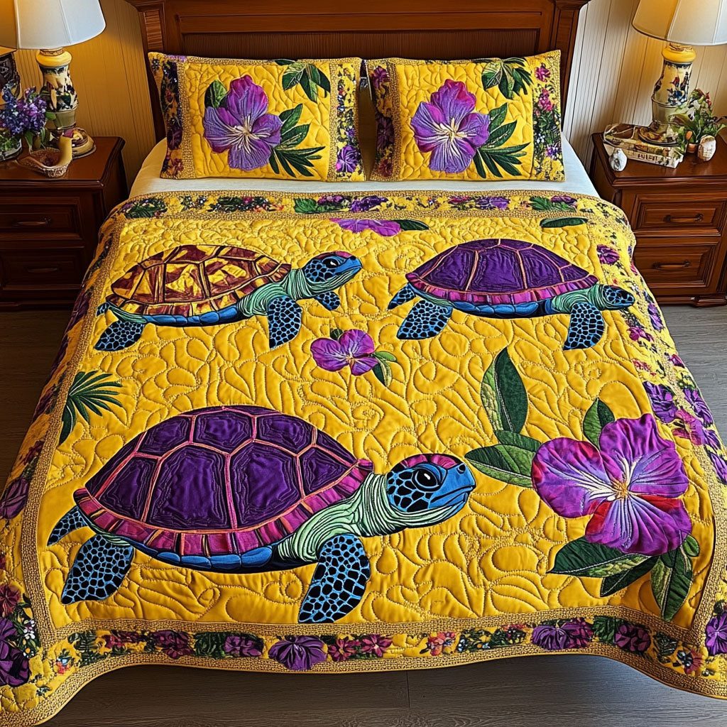 Sunset Swim quilted 3-piece bedding set on a made bed with two matching pillow shams