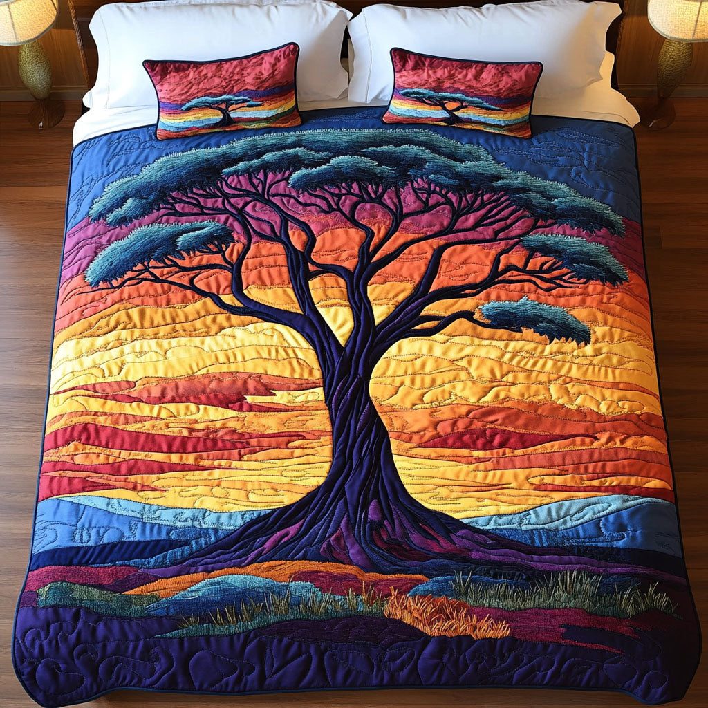 Sunset Tree quilted 3-piece bedding set on a made bed with two matching pillow shams