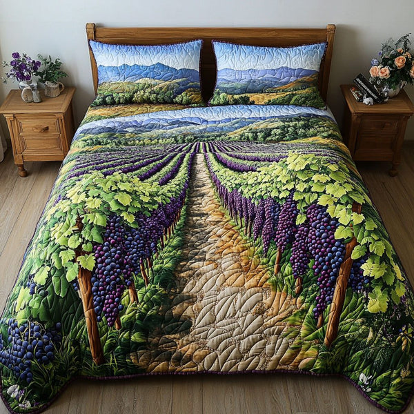 Sunset Vineyard quilted 3-piece bedding set on a made bed with two matching pillow shams