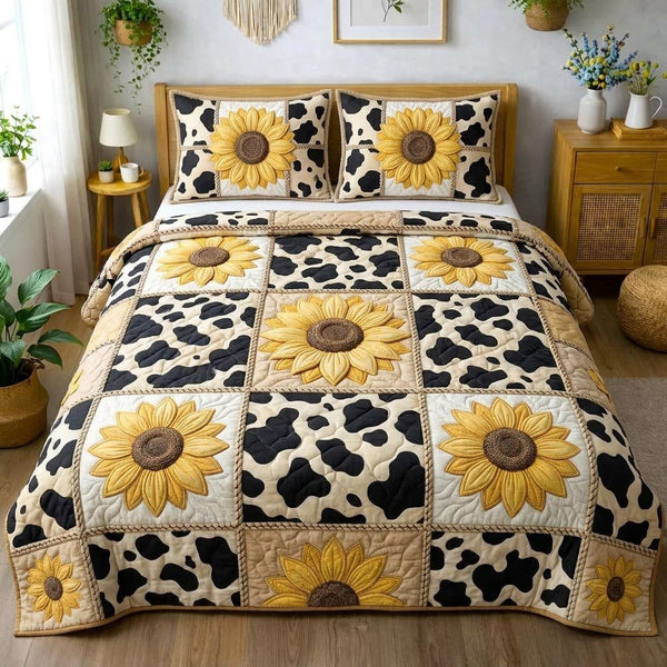 Sunshine Bloom quilted 3-piece bedding set on a made bed with two matching pillow shams