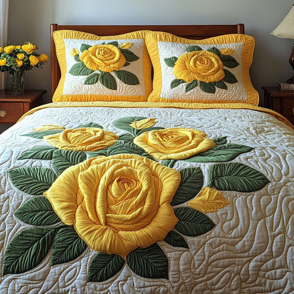 Sunshine Rose quilted 3-piece bedding set on a made bed with two matching pillow shams