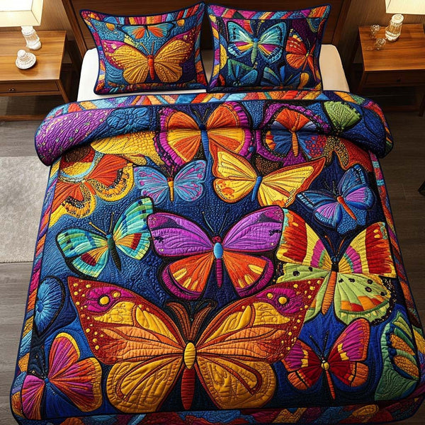 Sweet Butterfly Moments quilted 3-piece bedding set on a made bed with two matching pillow shams