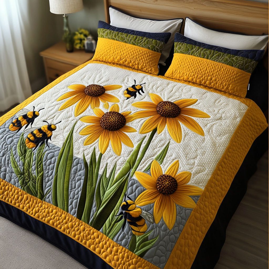 Sweet Pollination quilted 3-piece bedding set on a made bed with two matching pillow shams