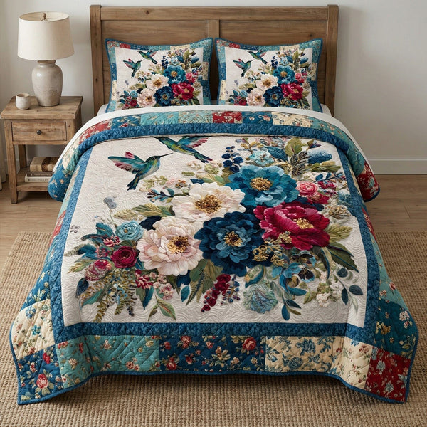 Teal Garden quilted 3-piece bedding set on a made bed with two matching pillow shams