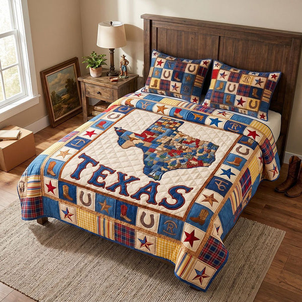 The Great Texan quilted 3-piece bedding set on a made bed with two matching pillow shams