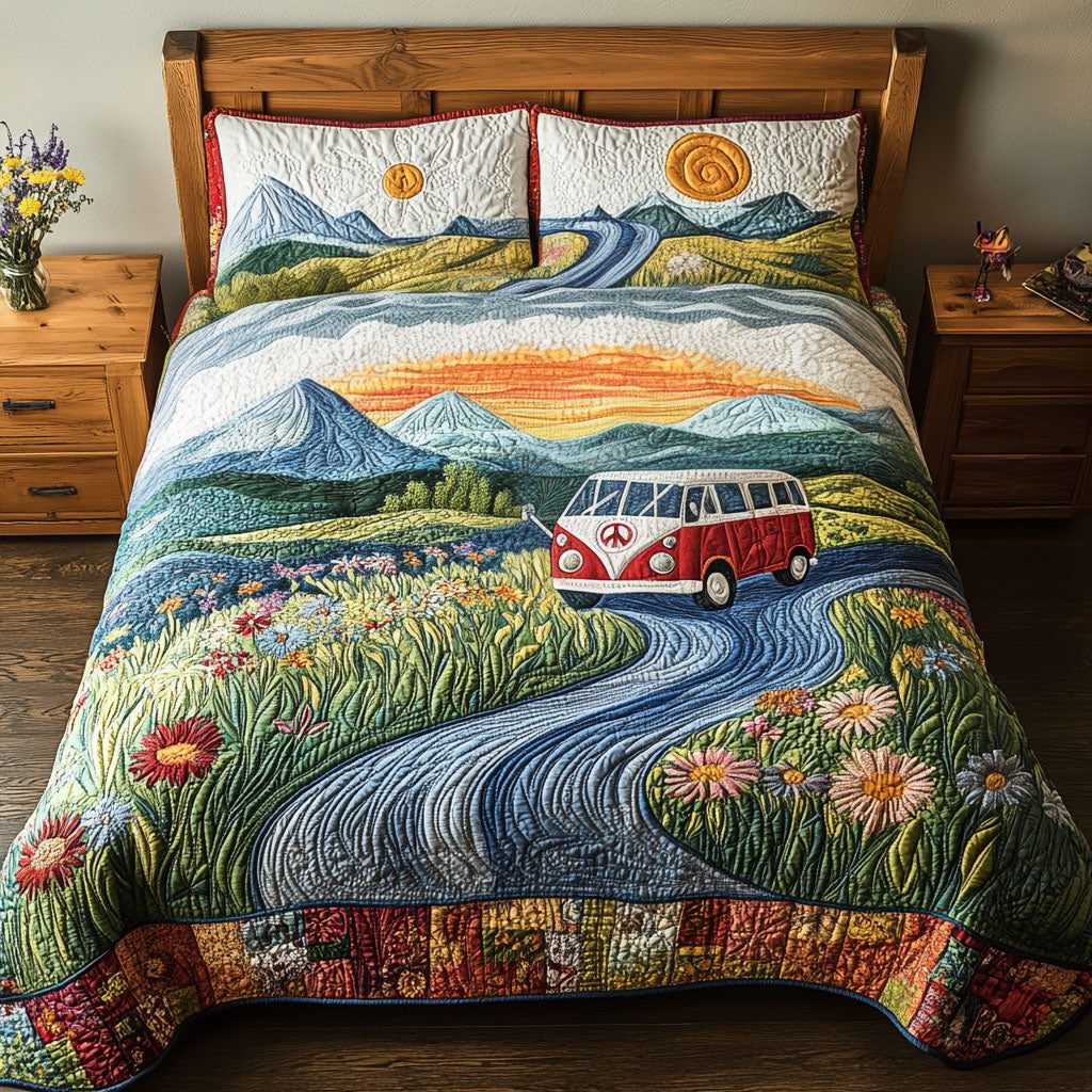 The Peaceful Explorer quilted 3-piece bedding set on a made bed with two matching pillow shams