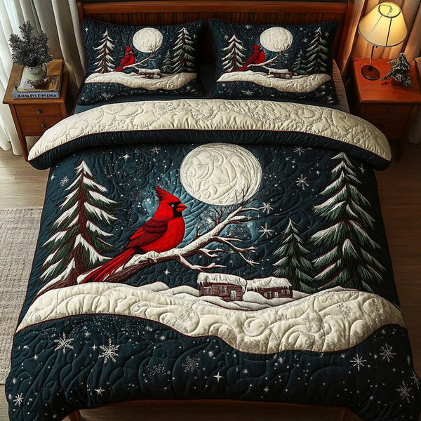 The Scarlet Flight quilted 3-piece bedding set on a made bed with two matching pillow shams