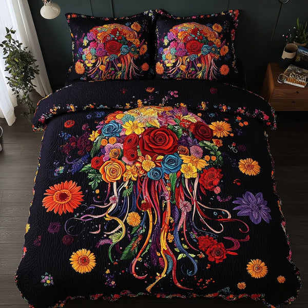 Tidal Grace quilted 3-piece bedding set on a made bed with two matching pillow shams
