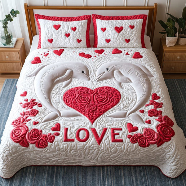 Tidal Hearts quilted 3-piece bedding set on a made bed with two matching pillow shams