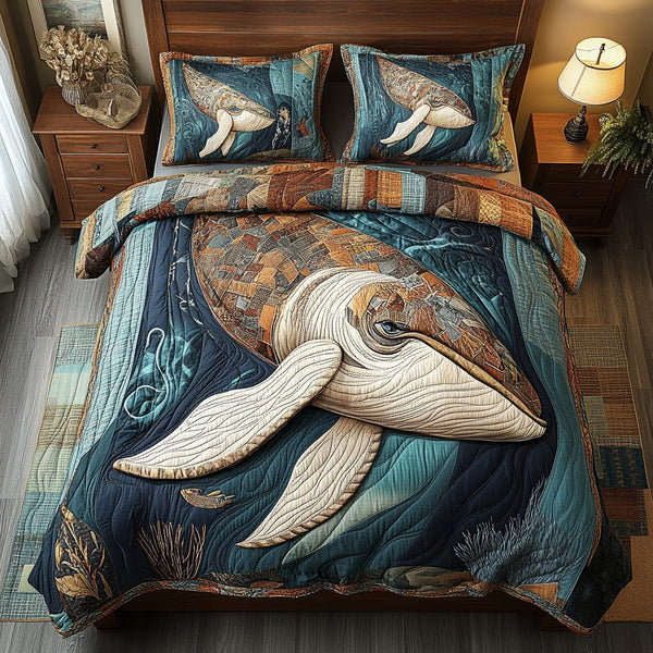 Tidal Majesty quilted 3-piece bedding set on a made bed with two matching pillow shams