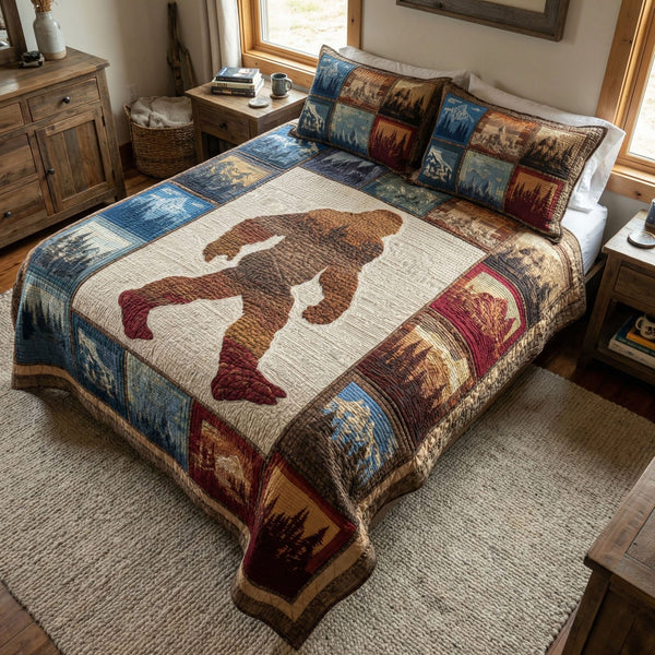 Timber Trail Legend quilted 3-piece bedding set on a made bed with two matching pillow shams