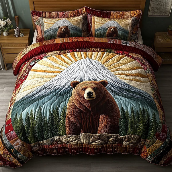 Timber Wanderer quilted 3-piece bedding set on a made bed with two matching pillow shams