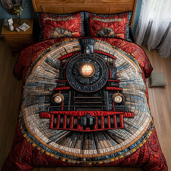 Train Tracks quilted 3-piece bedding set on a made bed with two matching pillow shams