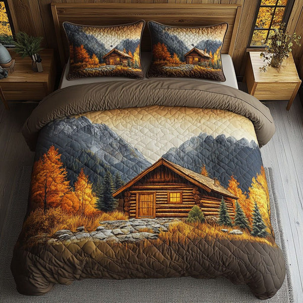 Tranquil Autumn quilted 3-piece bedding set on a made bed with two matching pillow shams