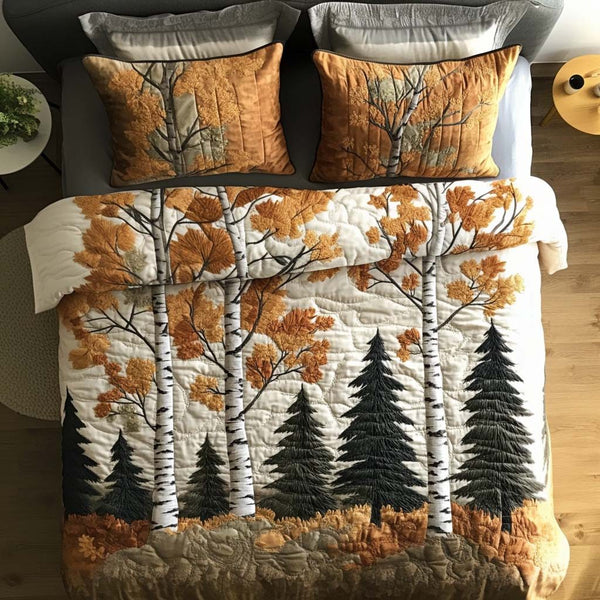Tranquil Forest quilted 3-piece bedding set on a made bed with two matching pillow shams
