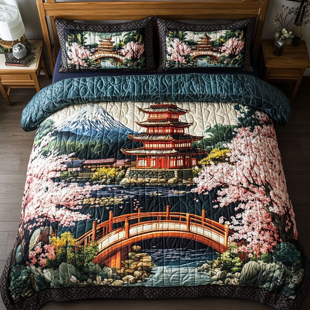 Tranquil Pagoda quilted 3-piece bedding set on a made bed with two matching pillow shams
