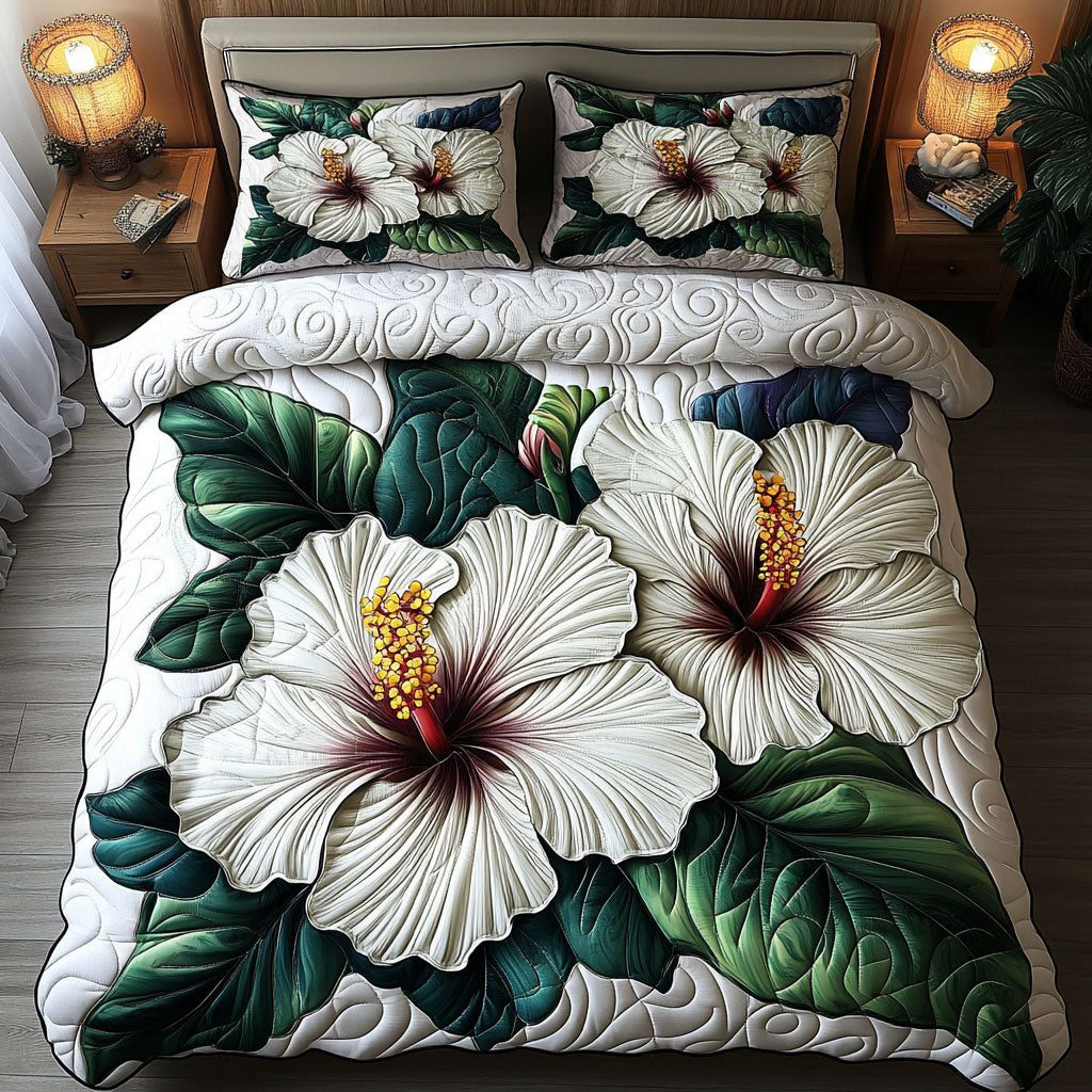 Tranquil Petal Dream quilted 3-piece bedding set on a made bed with two matching pillow shams