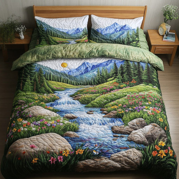 Tranquil Stream quilted 3-piece bedding set on a made bed with two matching pillow shams