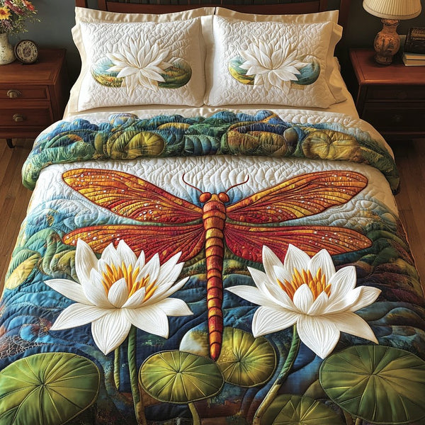 Tranquil Wings quilted 3-piece bedding set on a made bed with two matching pillow shams
