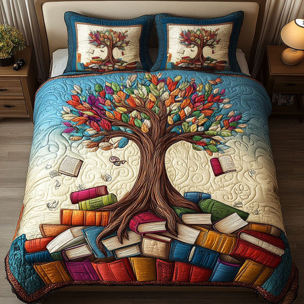 Tree of Knowledge quilted 3-piece bedding set on a made bed with two matching pillow shams