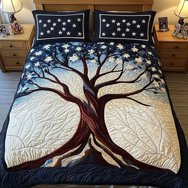 Tree Of Life quilted 3-piece bedding set on a made bed with two matching pillow shams
