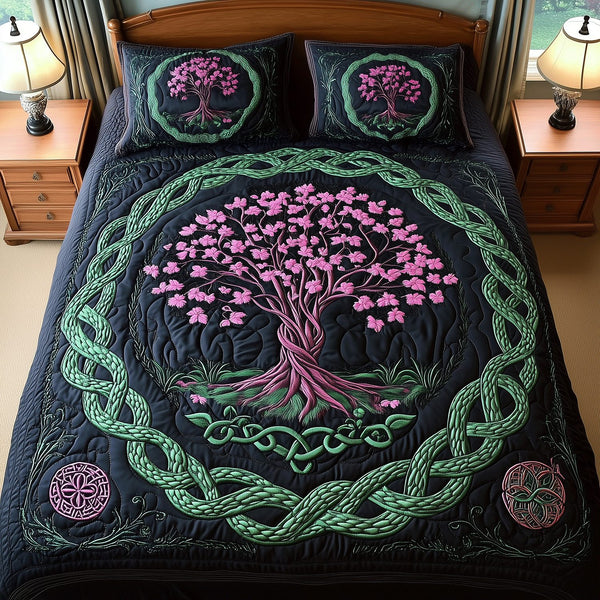 Tree of Unity quilted 3-piece bedding set on a made bed with two matching pillow shams