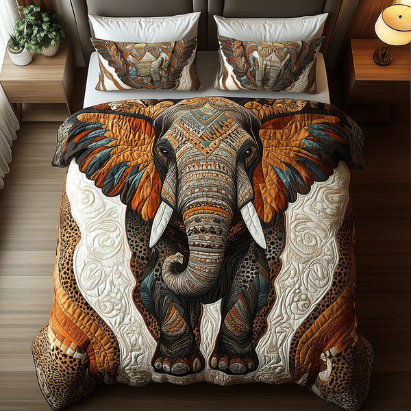 Tribal Elephant quilted 3-piece bedding set on a made bed with two matching pillow shams