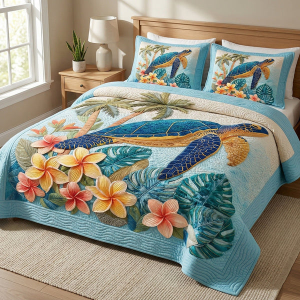 Tropical Bloom quilted 3-piece bedding set on a made bed in a light coastal bedroom