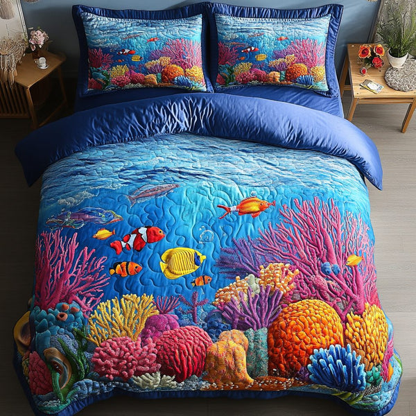 Tropical Coral quilted 3-piece bedding set on a made bed in a light coastal bedroom