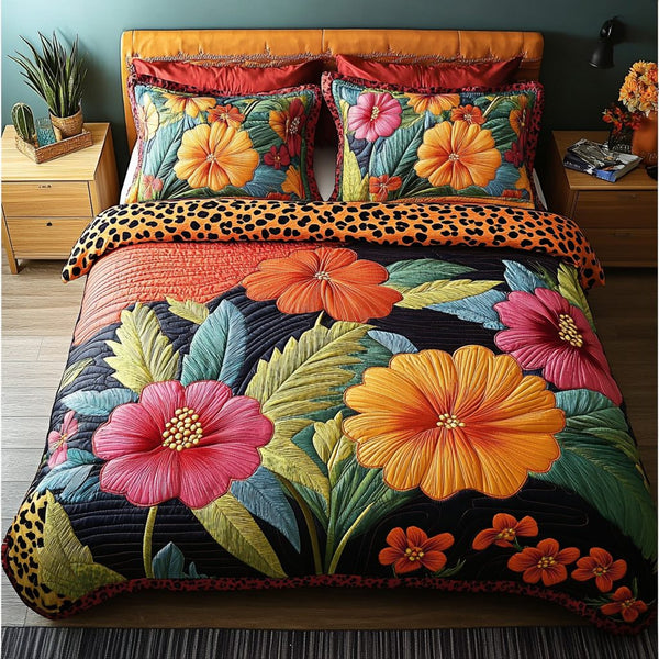 Tropical Escape quilted 3-piece bedding set on a made bed in a light coastal bedroom