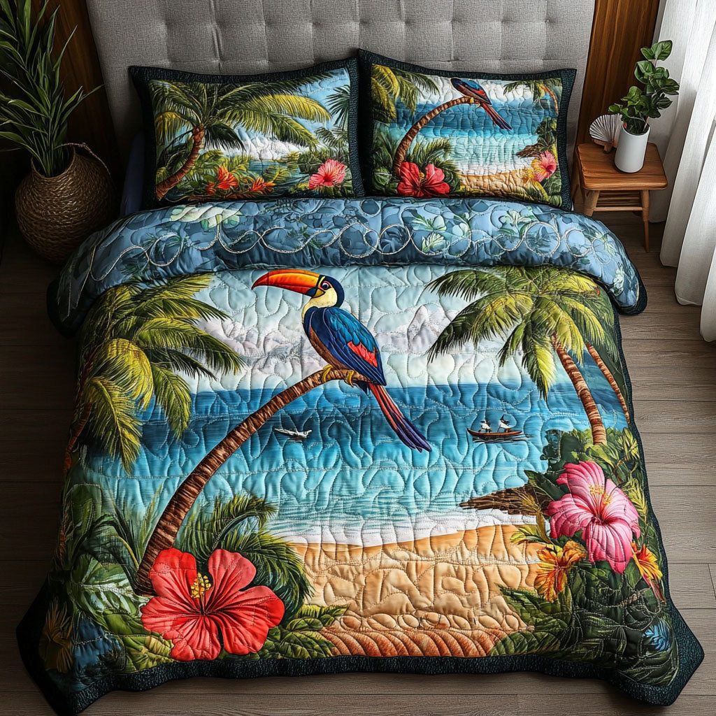 Tropical Escape quilted 3-piece bedding set on a made bed in a light coastal bedroom