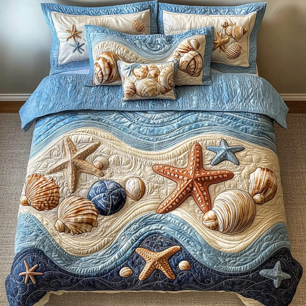Tropical Tide quilted 3-piece bedding set on a made bed in a light coastal bedroom