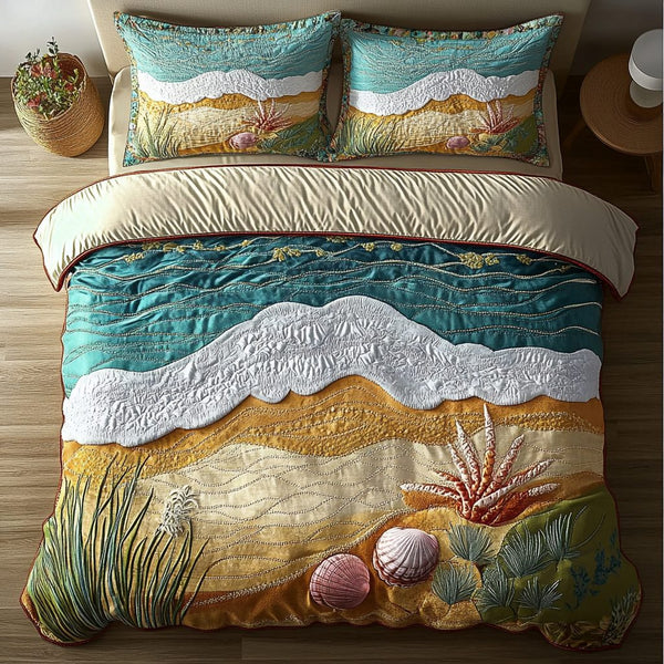 Tropical Tides quilted 3-piece bedding set on a made bed in a light coastal bedroom