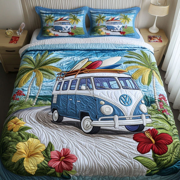 Tropical Wave Ride quilted 3-piece bedding set on a made bed in a light coastal bedroom
