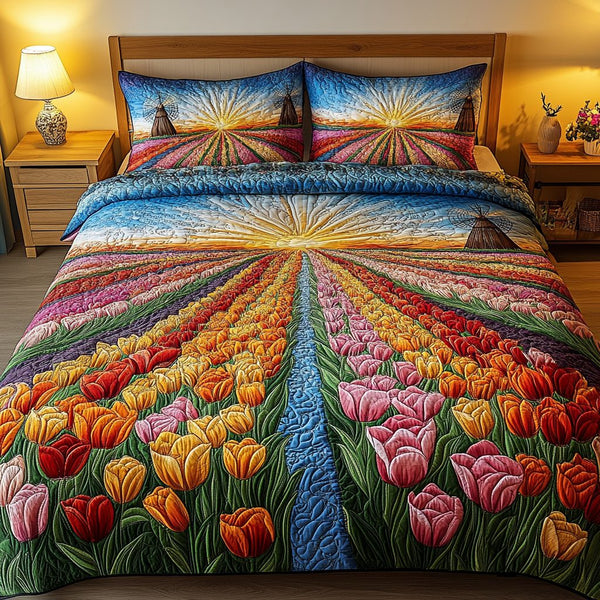 Tulip Garden quilted 3-piece bedding set on a made bed with two matching pillow shams