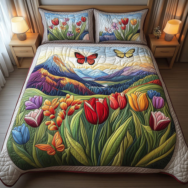 Tulip Serenity quilted 3-piece bedding set on a made bed with two matching pillow shams