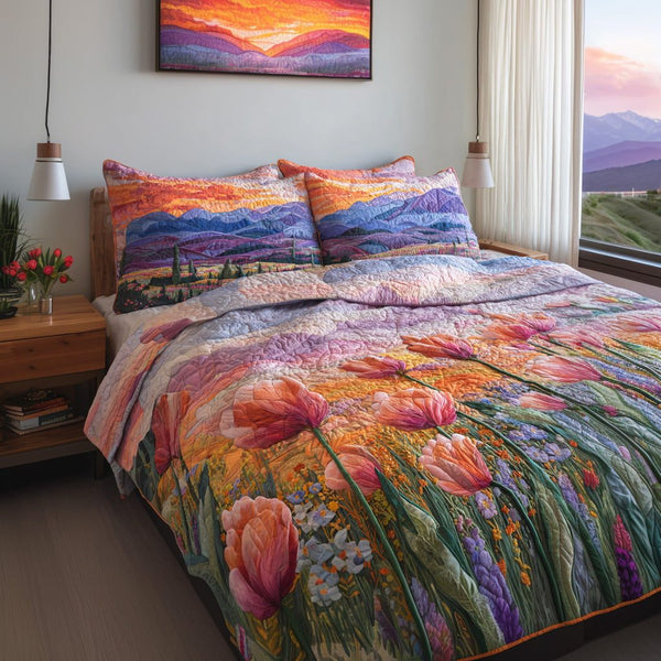 Tulip Sunrise quilted 3-piece bedding set on a made bed with two matching pillow shams