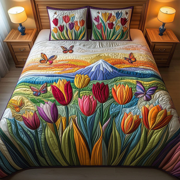 Tulip Valley quilted 3-piece bedding set on a made bed with two matching pillow shams
