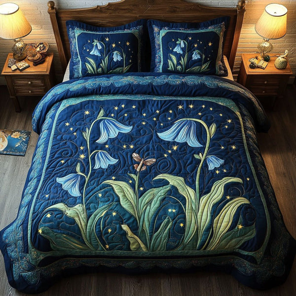 Twilight Breeze quilted 3-piece bedding set on a made bed with two matching pillow shams