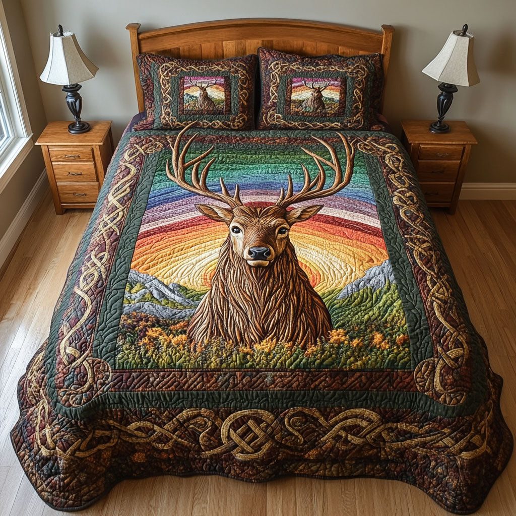 Twilight Deer Enchantment quilted 3-piece bedding set on a made bed with two matching pillow shams