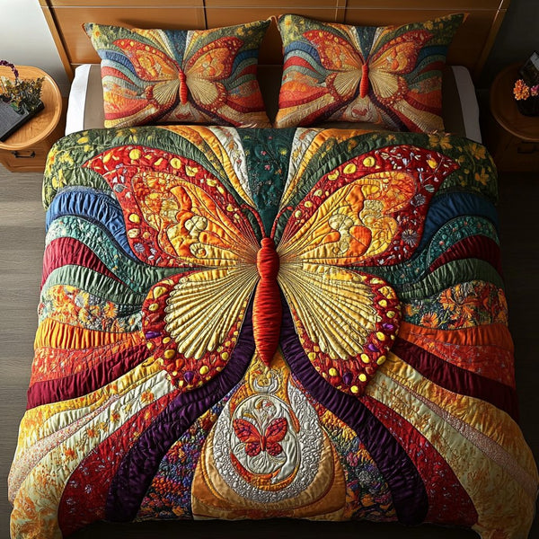 Twilight Flutter quilted 3-piece bedding set on a made bed with two matching pillow shams