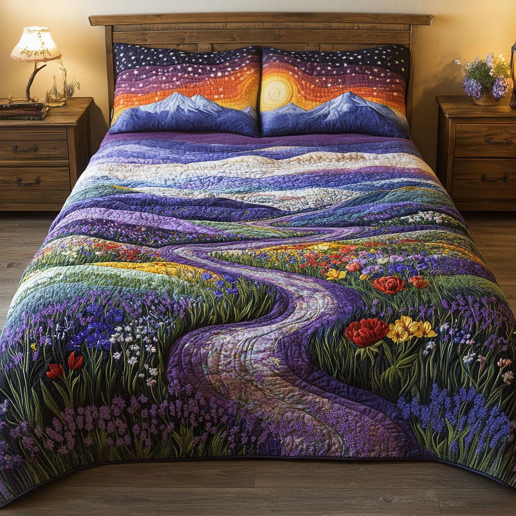 Twilight Meadow quilted 3-piece bedding set on a made bed with two matching pillow shams