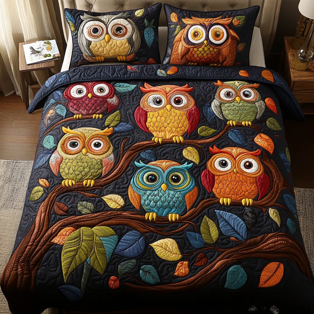 Twilight Owls quilted 3-piece bedding set on a made bed with two matching pillow shams