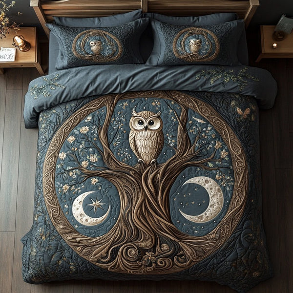 Twilight Wings quilted 3-piece bedding set on a made bed with two matching pillow shams