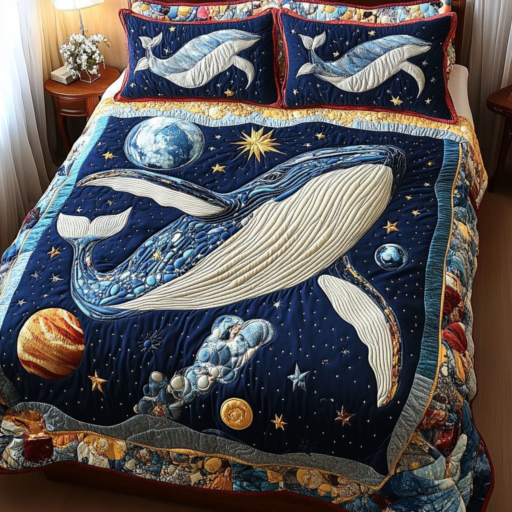 Universal Whale Wonder quilted 3-piece bedding set on a made bed in a light coastal bedroom