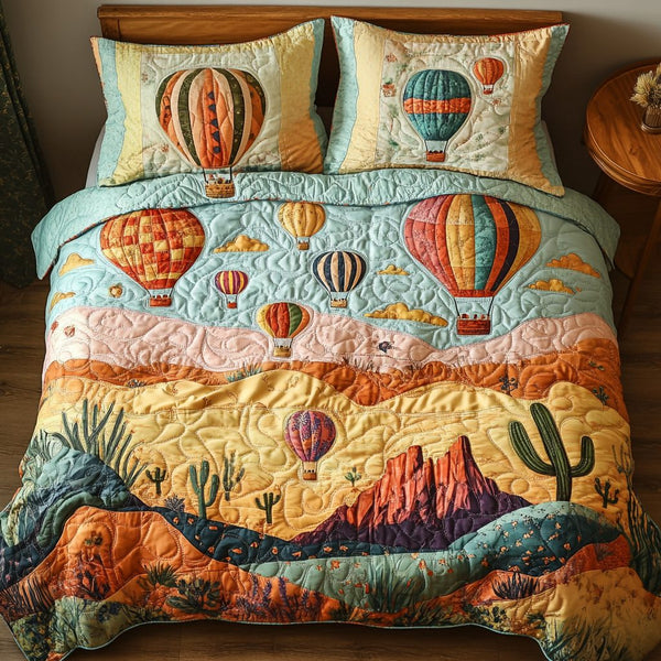 Upward Bound quilted 3-piece bedding set on a made bed with two matching pillow shams